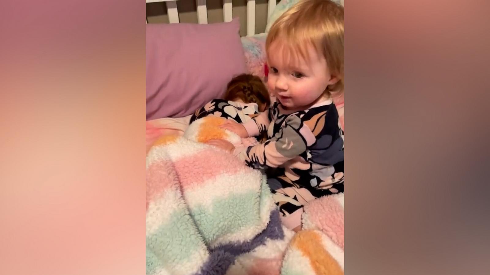 VIDEO: This toddler is the sweetest alarm clock in the morning for her sister