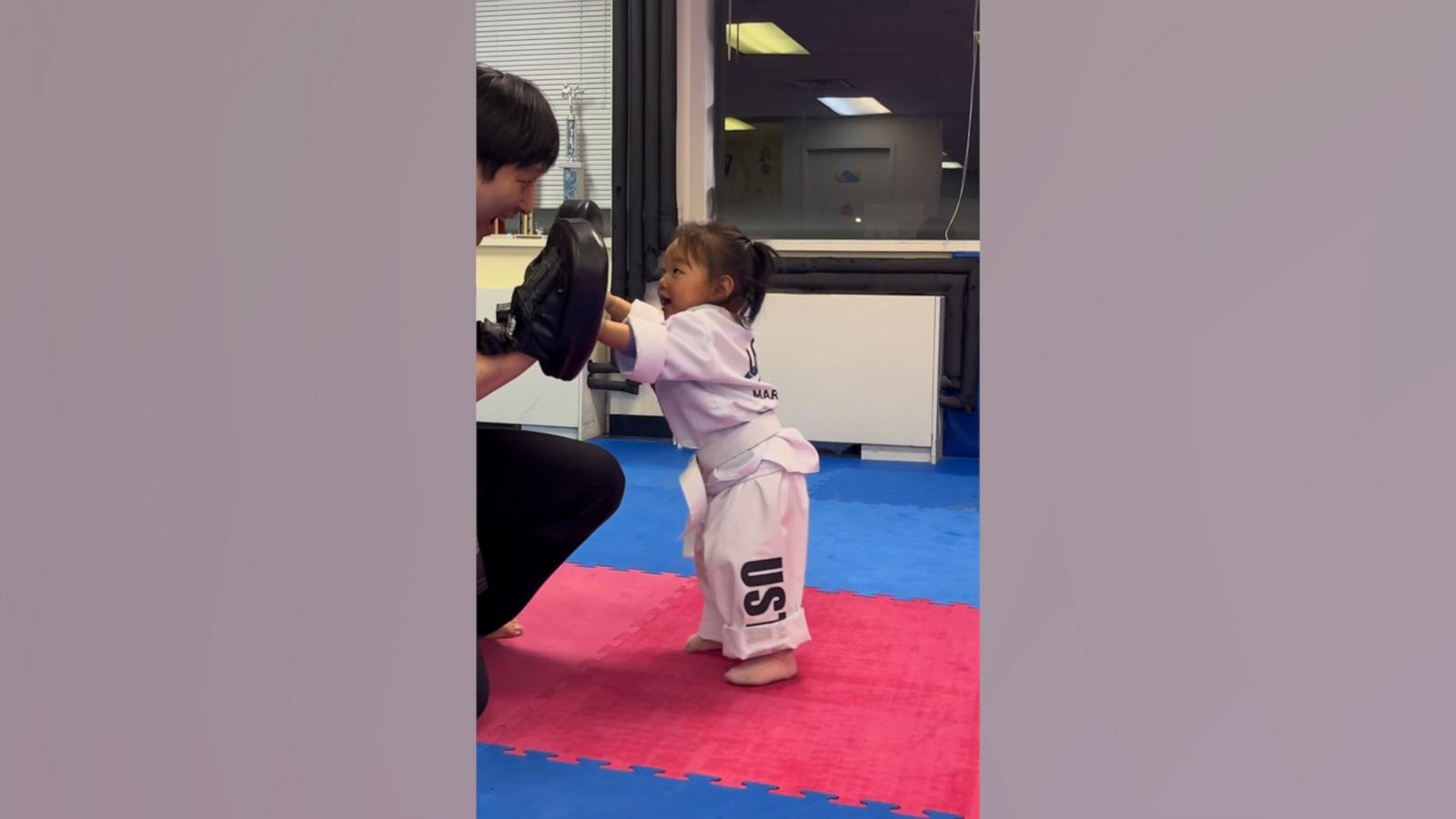 VIDEO: Toddler learns taekwondo from dad in adorable training sessions