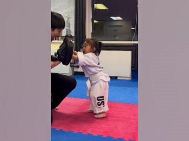 WATCH:  Toddler learns taekwondo from dad in adorable training sessions