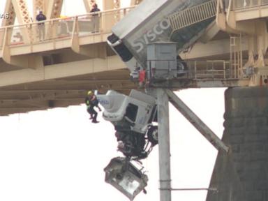 WATCH:  Video shows moment semi truck goes off bridge