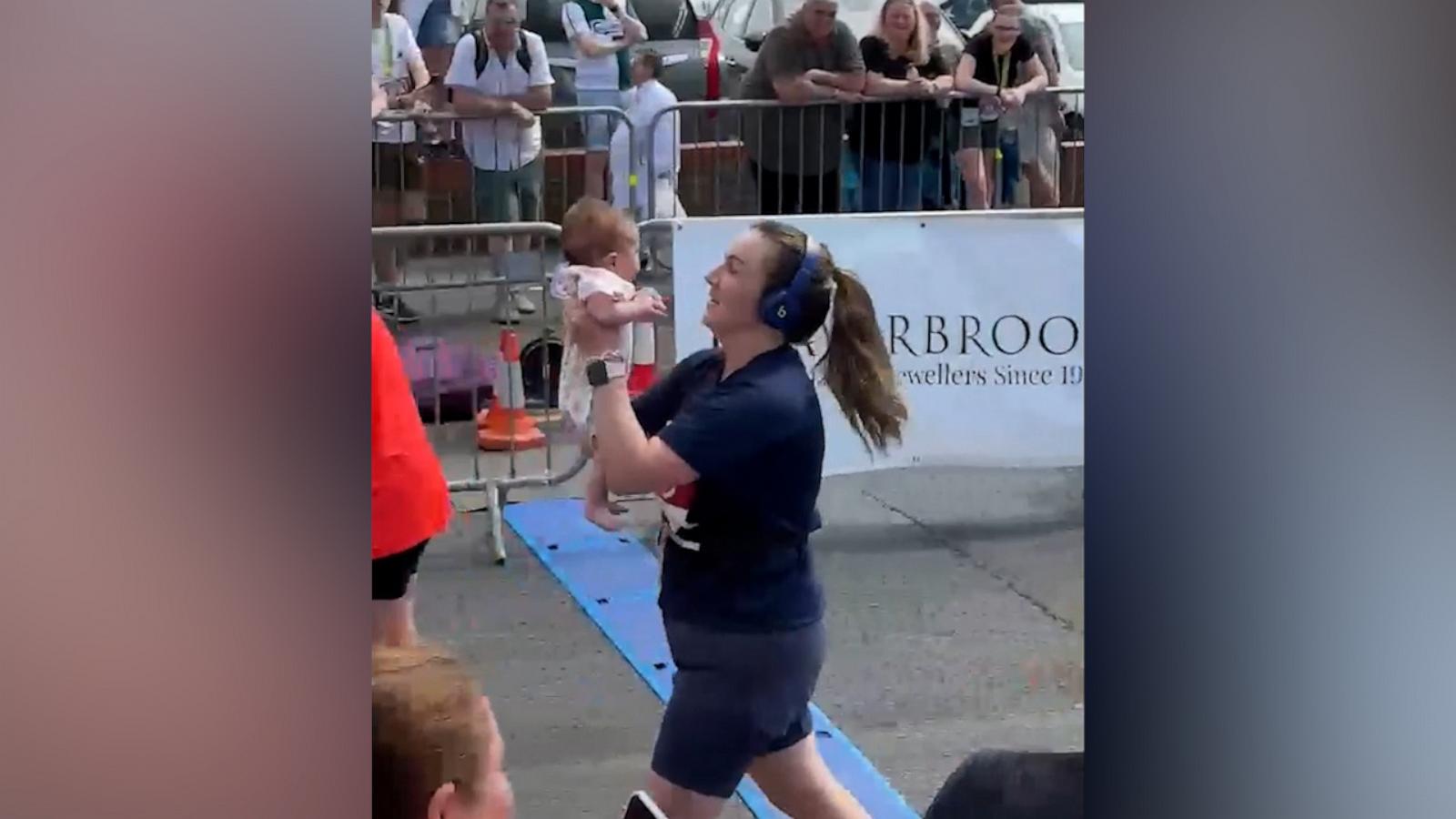 VIDEO: This runner carried her baby over the finish line of a 10K