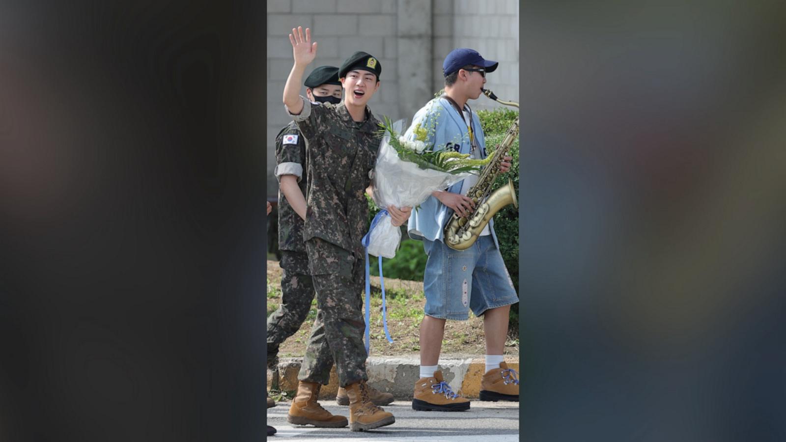 RM played the trumpet as fellow BTS members J-Hope, Jimin, V, and Jungkook lined up to embrace Jin, who was discharged from his mandatory service in the South Korean military.