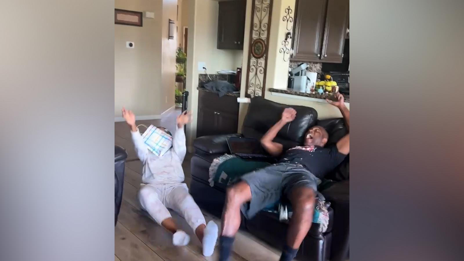 VIDEO: Parents literally toppled over with joy when they learned they would be grandparents