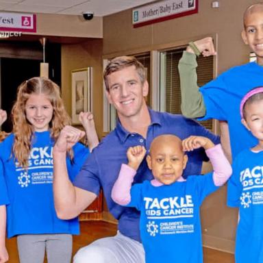 VIDEO: Eli Manning and Tom Coughlin help families of pediatric cancer patients