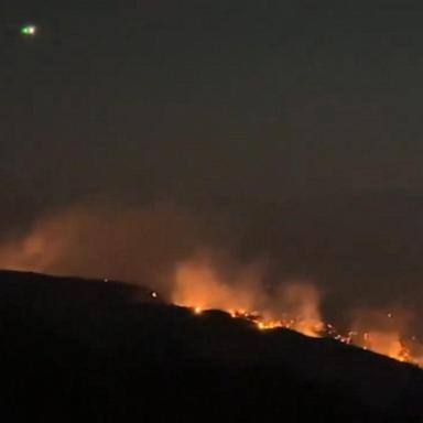 VIDEO: More than 60 large wildfires burn in the West