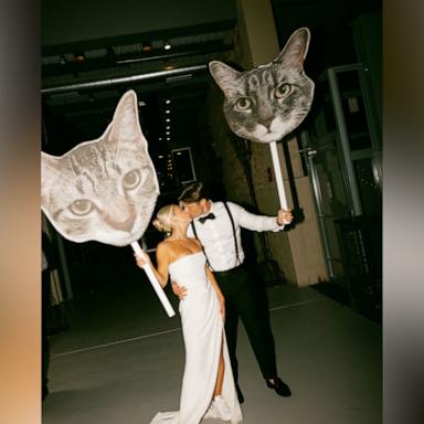 Couple celebrates wedding with giant cutouts of their cats