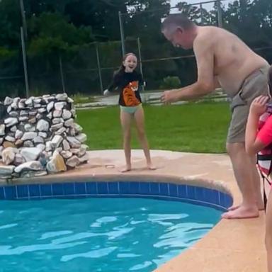 This grandfather did a fantastic front flip in the pool once his grandkids showed him how it's done.