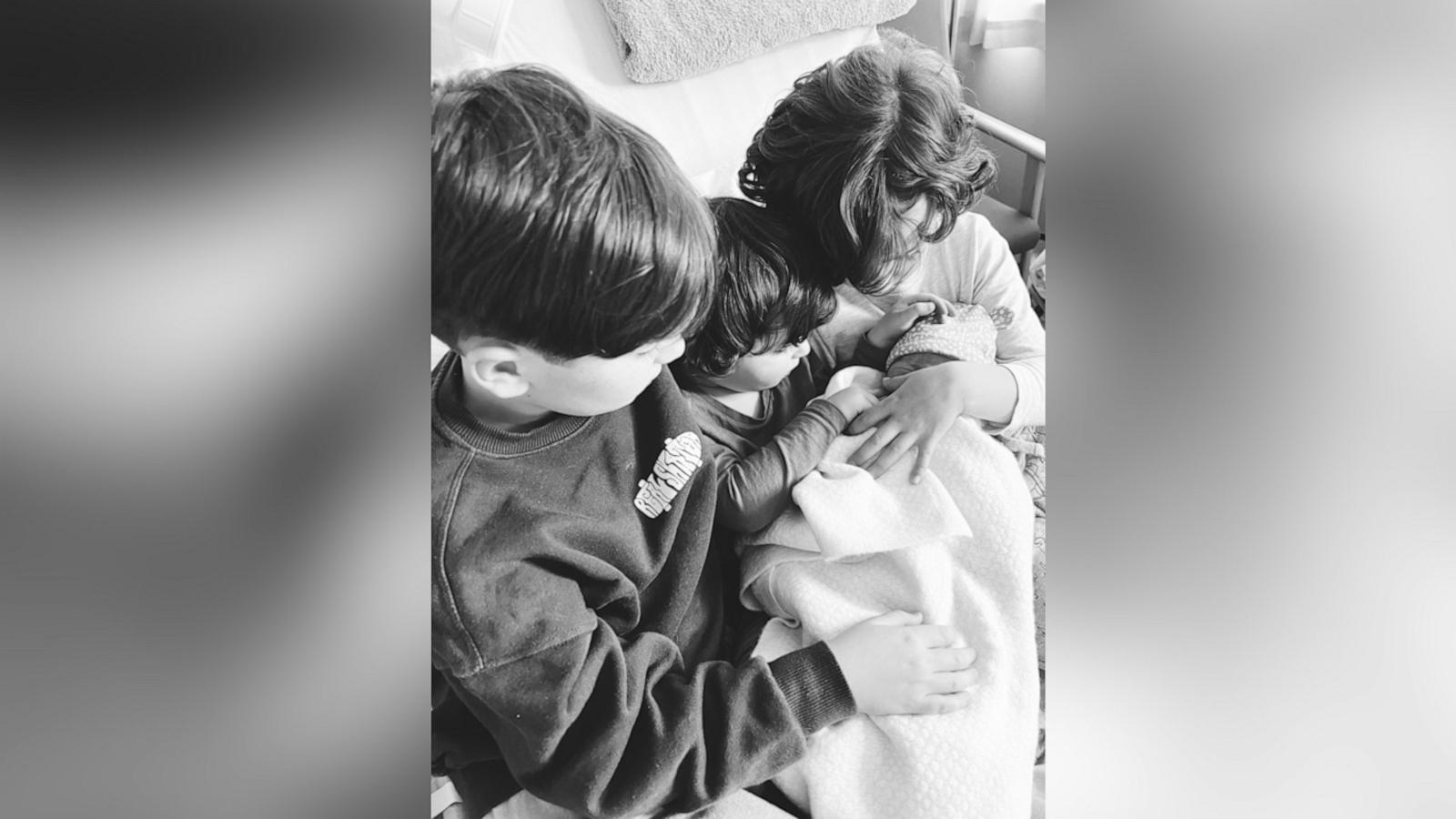 Brothers Jonah and Hugo waved from an airplane to their “baby sister” Lyra who was stillborn.