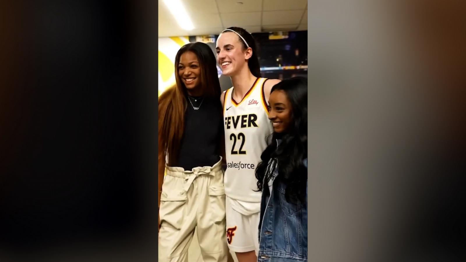 The Olympians then posed for photos with the rest of the members of the Indiana Fever.