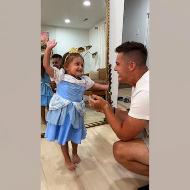 VIDEO: Dad makes daughter feel like a princess in her Cinderella dress 