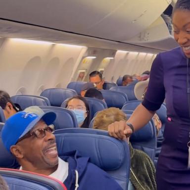 CAP: Brittney McQuiller, a Delta Airlines flight attendant, surprised her dad on his flight after not seeing him for over a year.