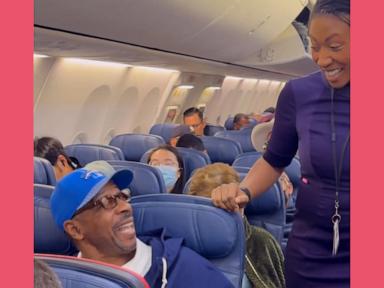 WATCH:  Flight attendant has a surprise reunion with her dad on his flight