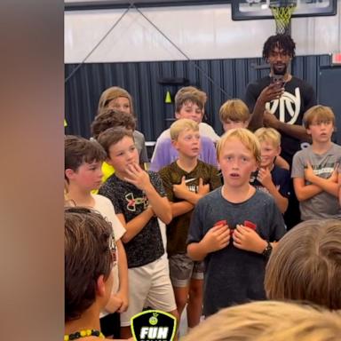 VIDEO: Boy vulnerably sings at basketball camp, gets wholesome response from teammates