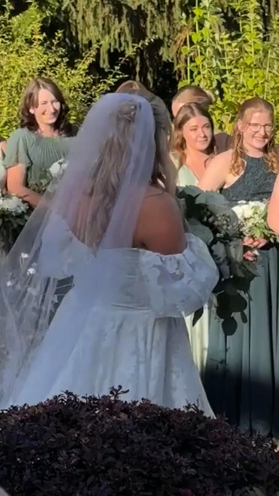 The groom, Albert Roman, got emotional at the sight of his bride, Hannah, when she walked down the aisle to his favorite movie soundtrack.