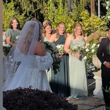 The groom, Albert Roman, got emotional at the sight of his bride, Hannah, when she walked down the aisle to his favorite movie soundtrack.