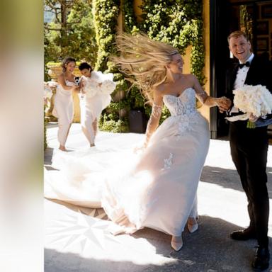 There were record winds on this couple’s wedding day and the photos are epic 