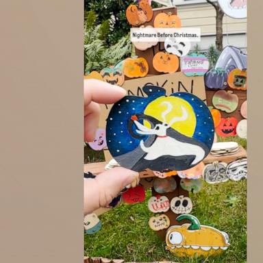 VIDEO: Community decorates wooden pumpkins and add to this artist's front yard gallery