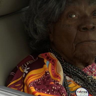 After casting her vote curbside, retired teacher Sonetta Clifton hopes to inspire the young generation to understand why voting matters.