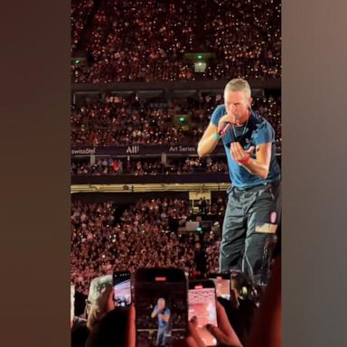 VIDEO: Chris Martin helps young fan find comfortable spot at concert 