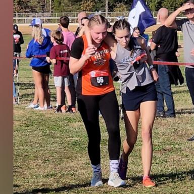 Student helps another runner finish race