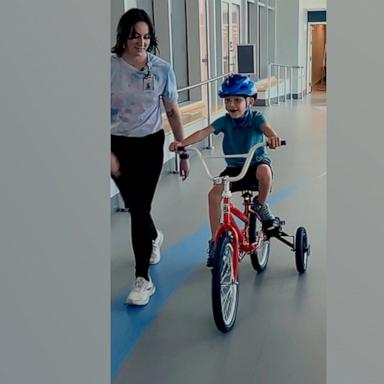 VIDEO: 7-year-old with rare genetic condition rides bike for 1st time 