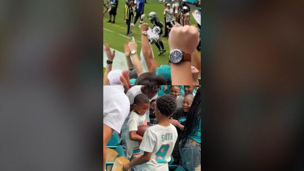 There are 65,000 seats at Hard Rock Stadium, home of the Miami Dolphins. When tight end Jonnu Smith threw the ball in the air in excitement after catching a touchdown pass, his biggest fan caught it.