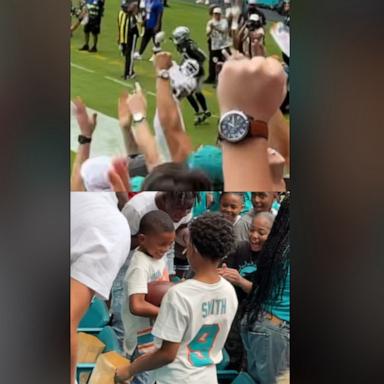 There are 65,000 seats at Hard Rock Stadium, home of the Miami Dolphins. When tight end Jonnu Smith threw the ball in the air in excitement after catching a touchdown pass, his biggest fan caught it.