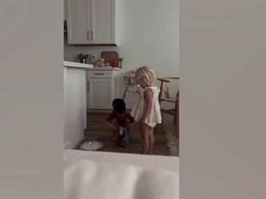 WATCH:  Brother and sister sneak into kitchen to steal popsicles