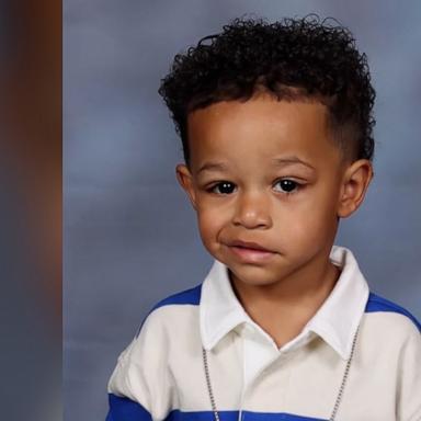 Mom asks her kid to smile as he did for his school pictures. 