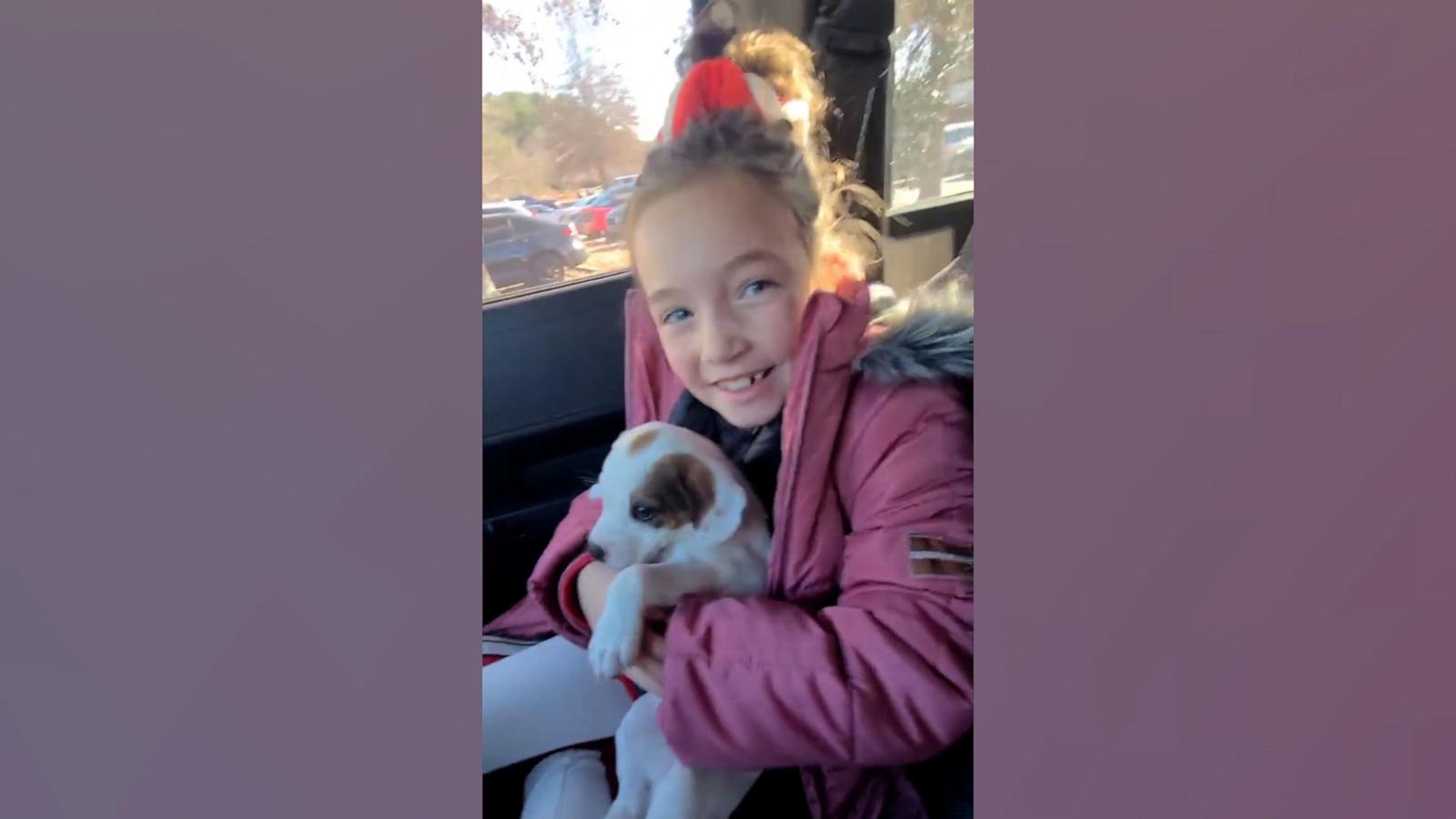 Tabitha Grayson surprised her daughter, Georgia, with an adorable puppy while picking her up from school.