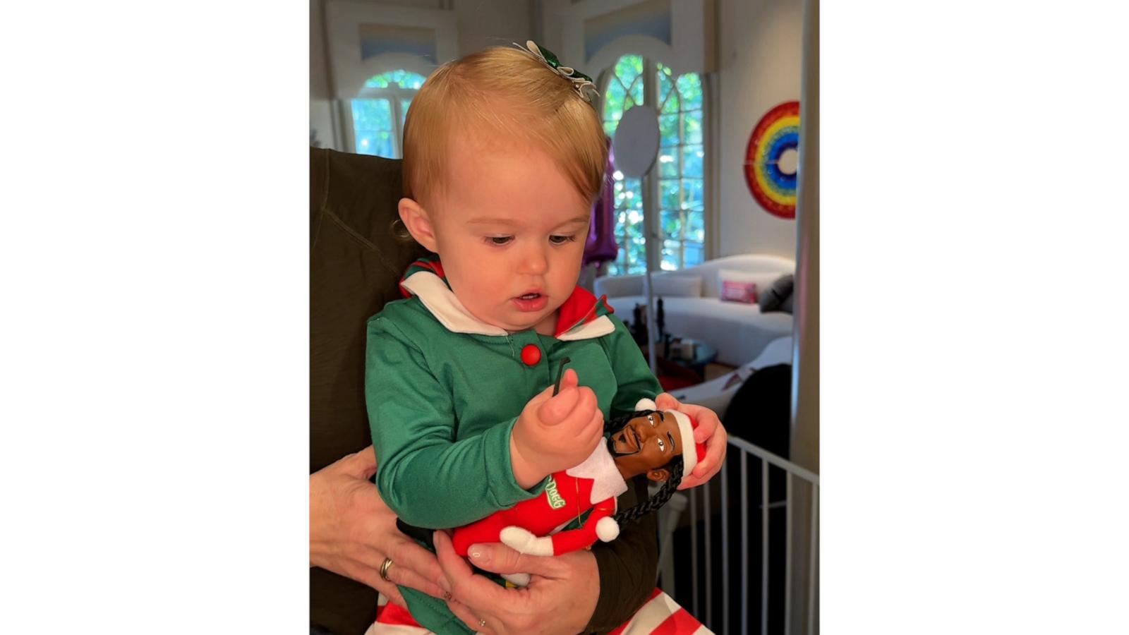 Paris Hilton's daughter loves Snoop Dogg elf toy