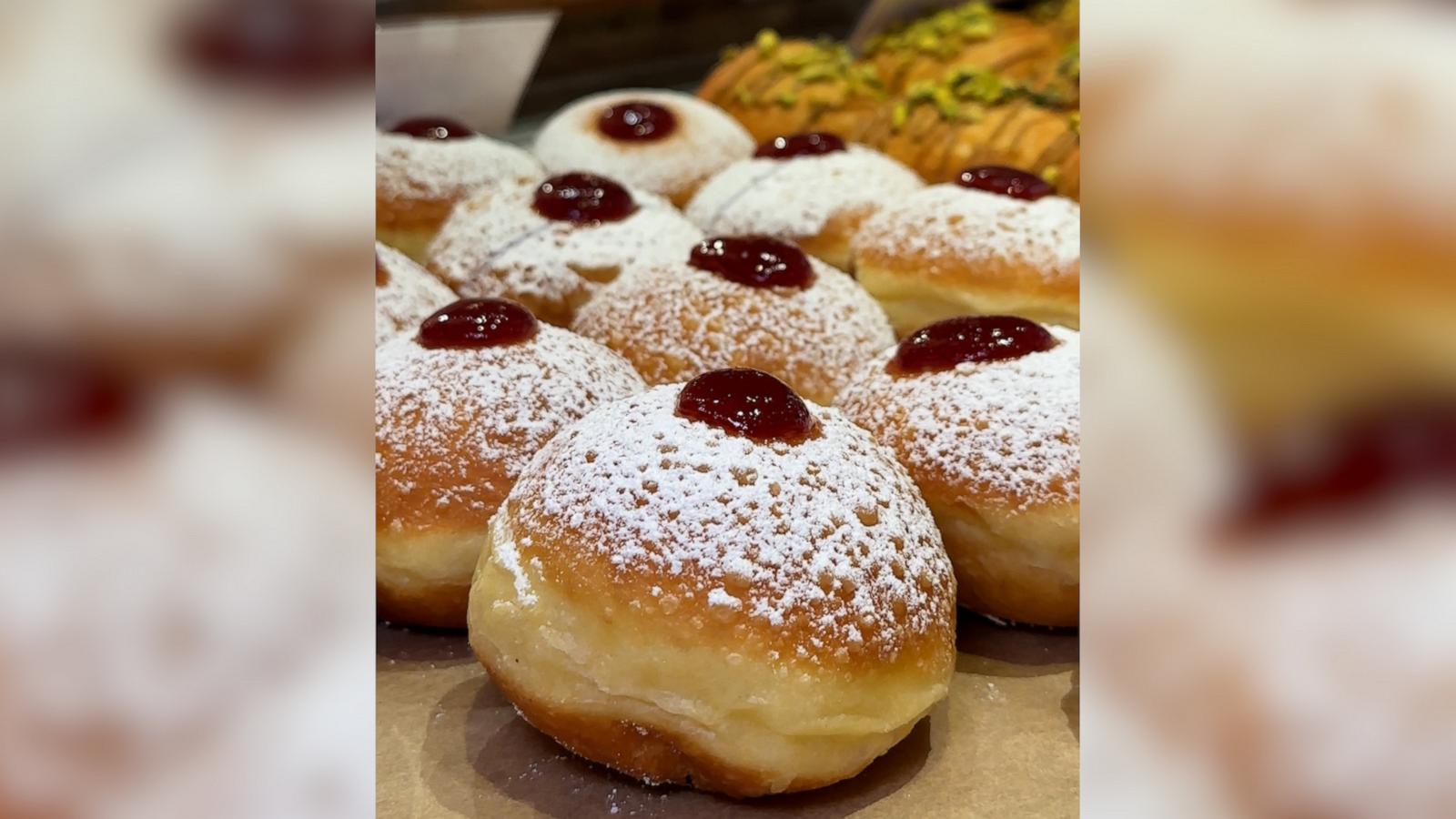 ‘Breads Bakery’ in New York City keeps the tradition of commemorating fried food for Hanukkah by making their creative assortment of jelly donuts for the holiday.