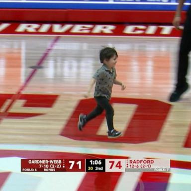 VIDEO: Little boy storms court at college basketball game