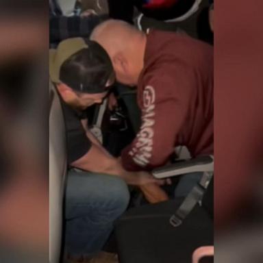 VIDEO: Unruly man restrained by passengers mid-flight