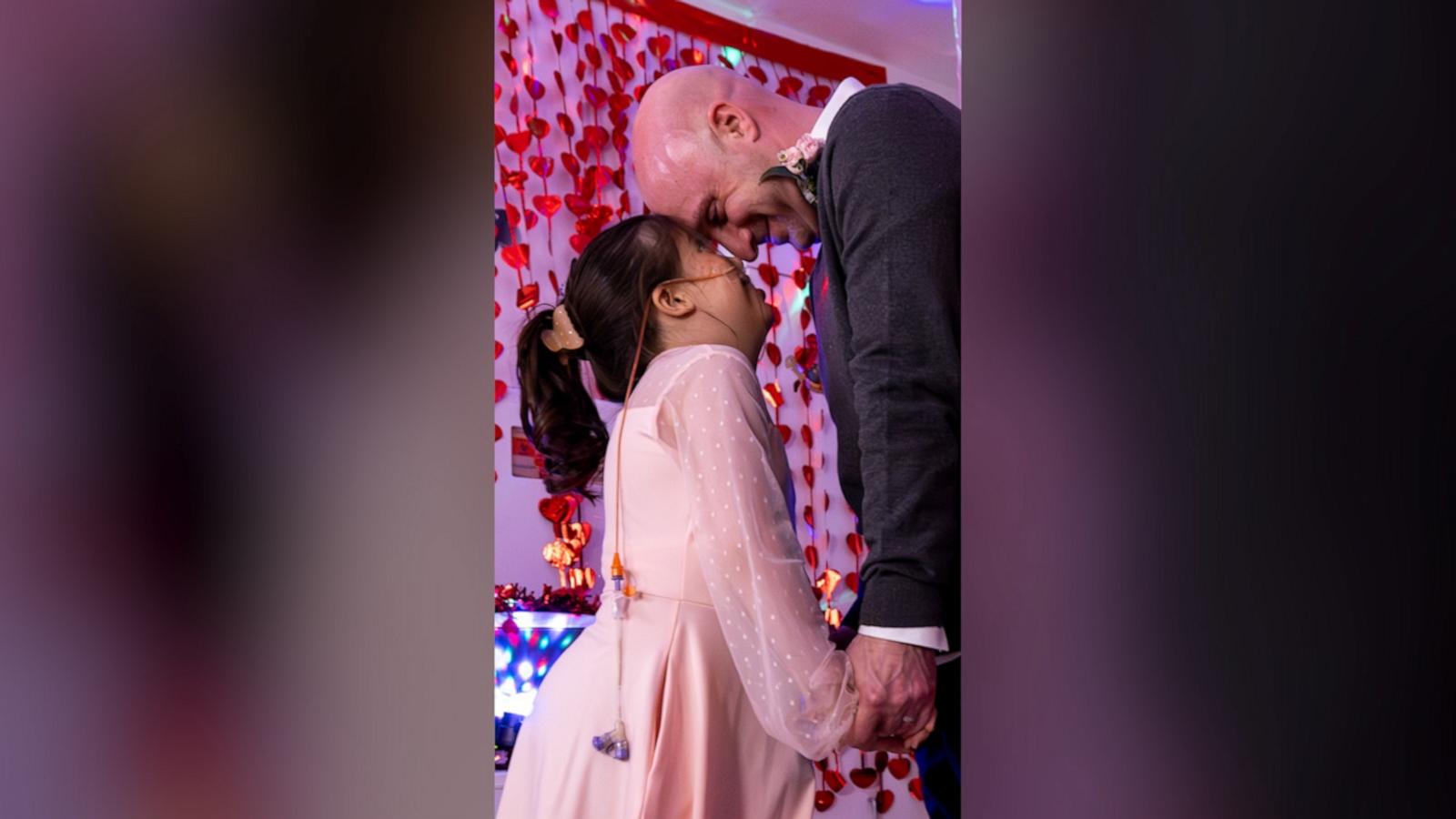 Ten-year-old Ava Cooper has been in the hospital for over 200 days, waiting for a donor's heart. So, her caregivers brought the daddy-daughter dance to her.