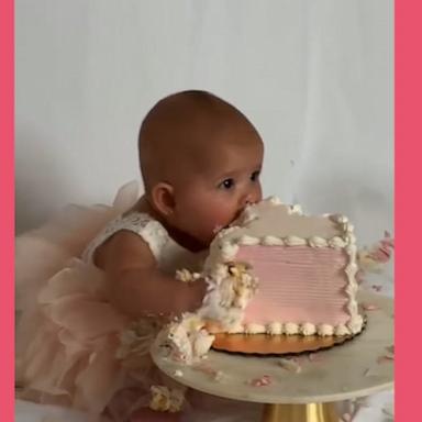 Baby girl loves to smash her birthday cake