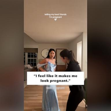 Aimee Winfield had her best friends come over so she could try on her bridesmaid dress for a wedding they were all in. Then, she delivered the news in a clever way.