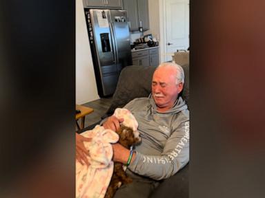 WATCH:  Family surprises dad with puppy after he loses his mom