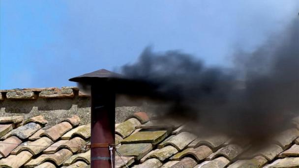 Black smoke rises from Sistine Chapel as conclave continues