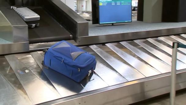 Toddler rescued after riding airport baggage conveyor belt