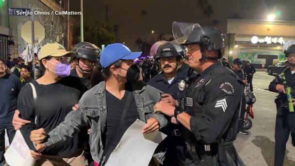 Protests against immigration raids spread across US