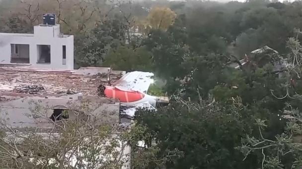Investigators search for answers in India plane crash