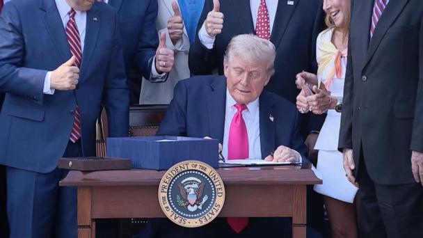 President Trump signs massive spending bill into law