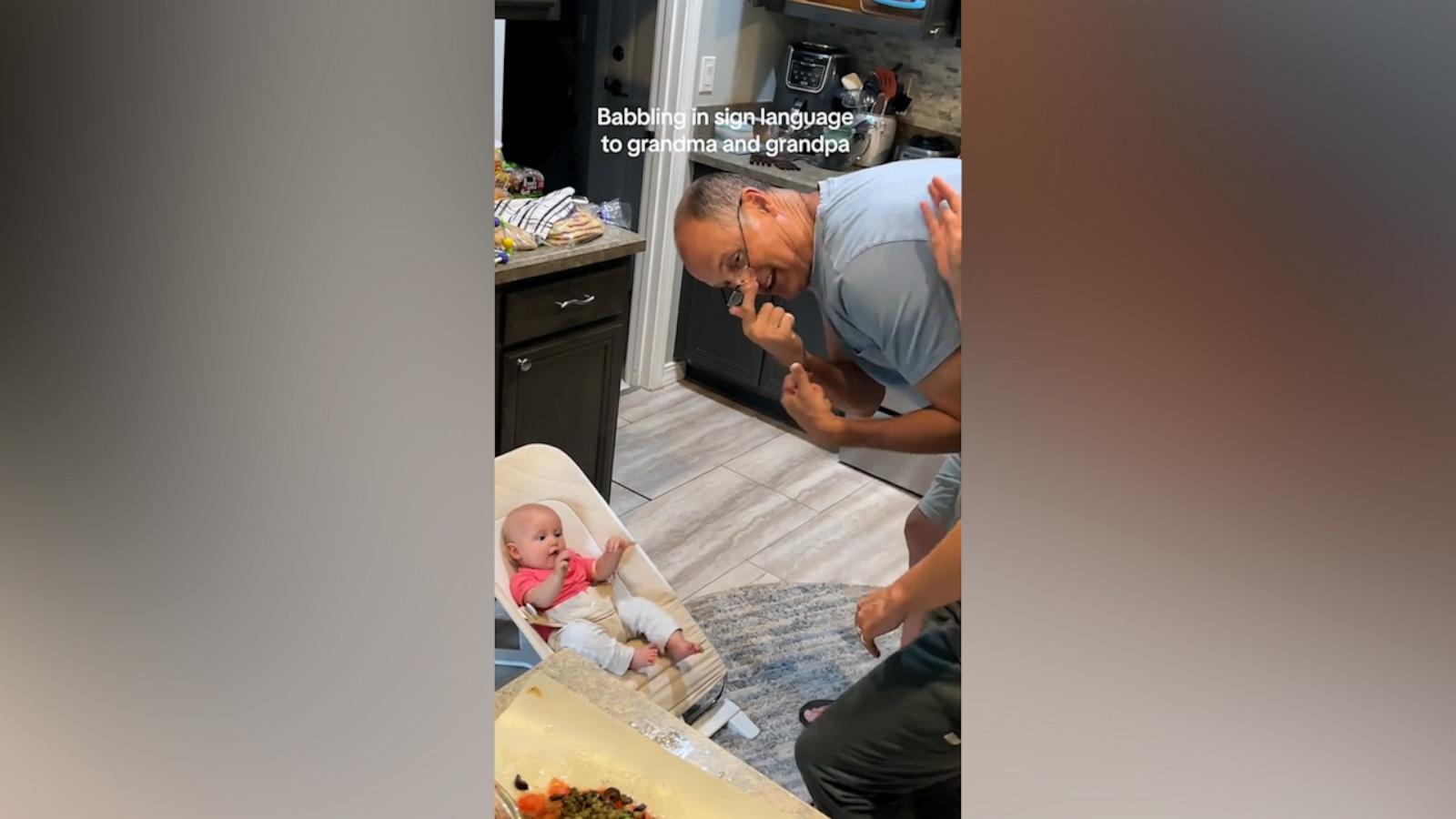 Baby communicates with her grandparents in sign language