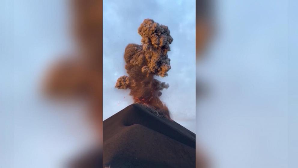 VIDEO: Tourists flee erupting volcano