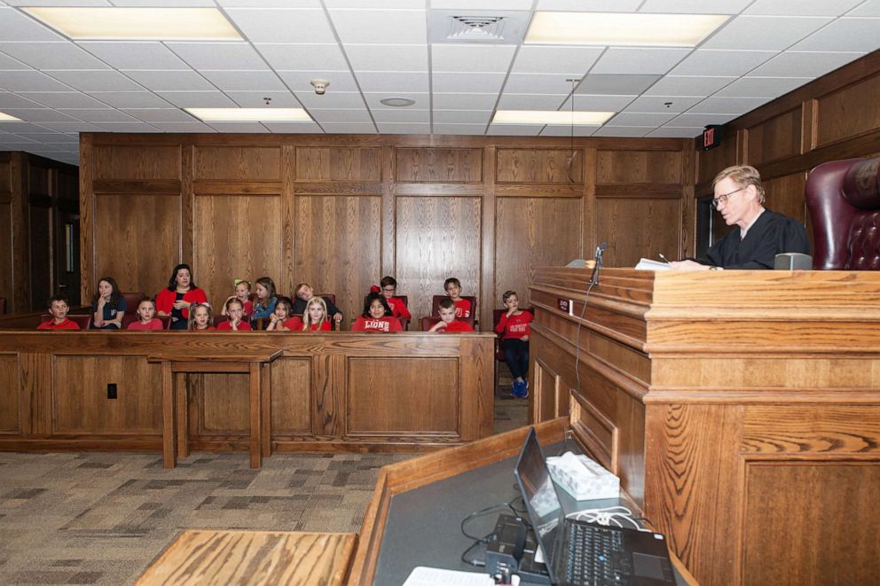 PHOTO: An 8-year-old girl was surprised by her 2nd grade classmates during her and her 2-year-old sister's adoption hearing in Lubbock, Texas.