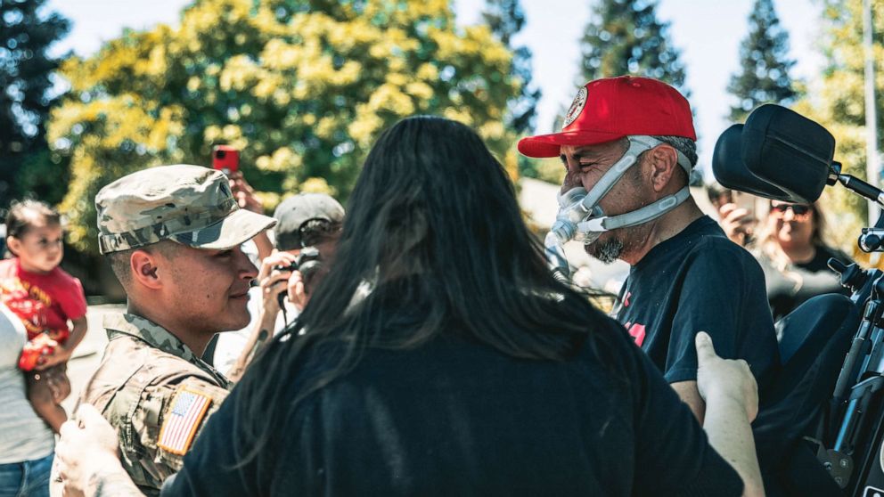 PHOTO: Jordan Salinas’ homecoming was a surprise for his father, Jesus Salinas, who is battling an aggressive form of ALS. 