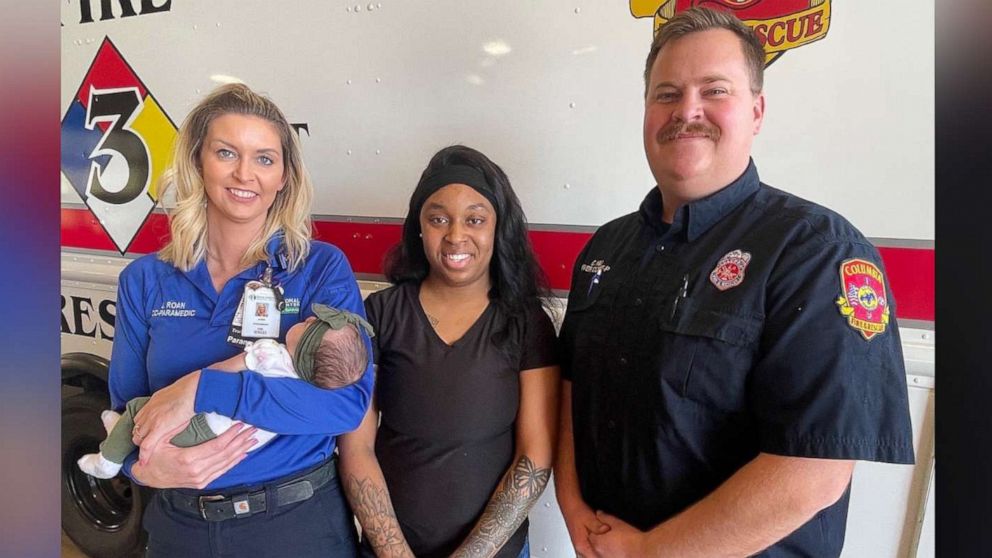 PHOTO: Jamie Roan, left, and Cody Hill, right, pose with Kitana Garrett and her daughter Za'myla.