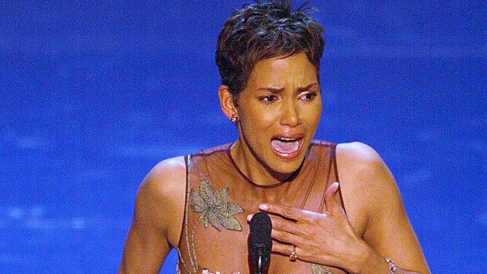 PHOTO: Actress Halle Berry accepts her Oscar for Best performance by an actress in a leading role during the 74th Academy Awards at the Kodak Theatre in Hollywood on March 24, 2002.
