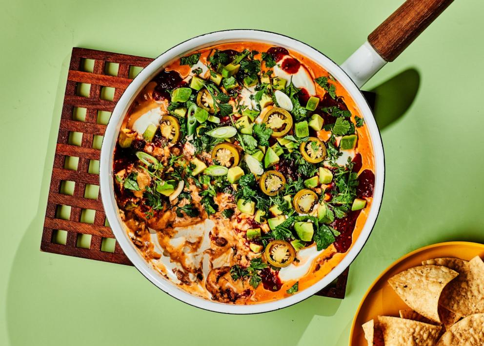 PHOTO: A bowl of warm 7-layer skillet dip.